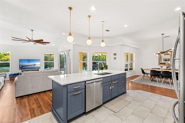 Dining room, Interior, Kitchen, Living room, Pendant Lights, Recessed Lighting, Stainless Steel Appliances, Wood Texture Flooring