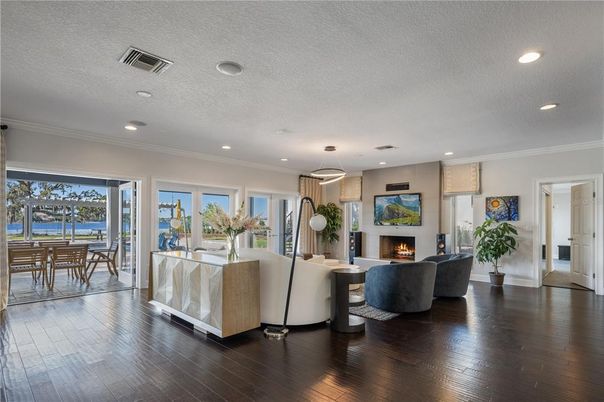 Dining room, Fireplace, Interior, Living room, Pendant Lights, Recessed Lighting, Wood Texture Flooring