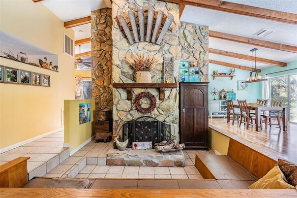 Dining room, Fireplace, Interior, Pendant Lights, Stone Walls, Wooden Beams