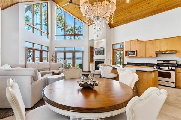 Chandelier, Dining room, Fireplace, Interior, Kitchen, Living room, Stainless Steel Appliances, Wooden Ceilings