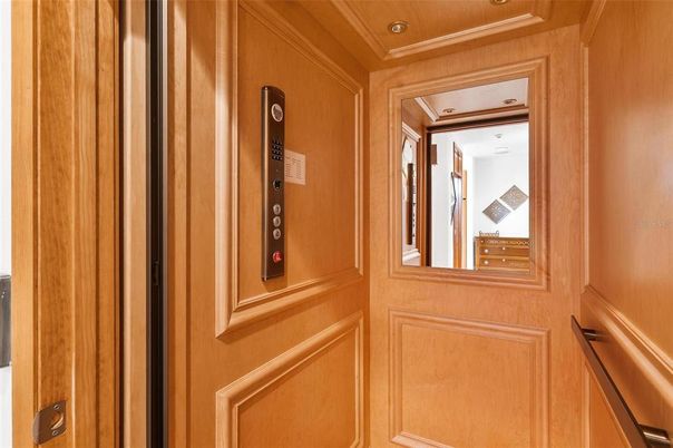 Elevator, Interior, Recessed Lighting, Wooden Ceilings, Wooden Walls