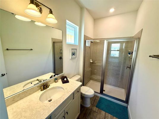 Bathroom, Glass Shower, Interior, Recessed Lighting, Wood Texture Flooring