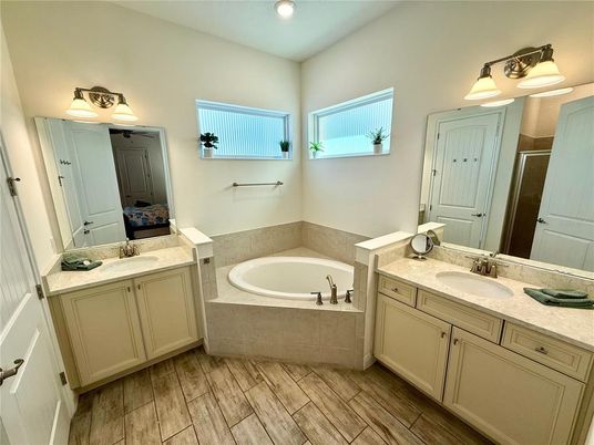 Bathroom, Dual Sink Vanities, Interior, Recessed Lighting, Wood Texture Flooring