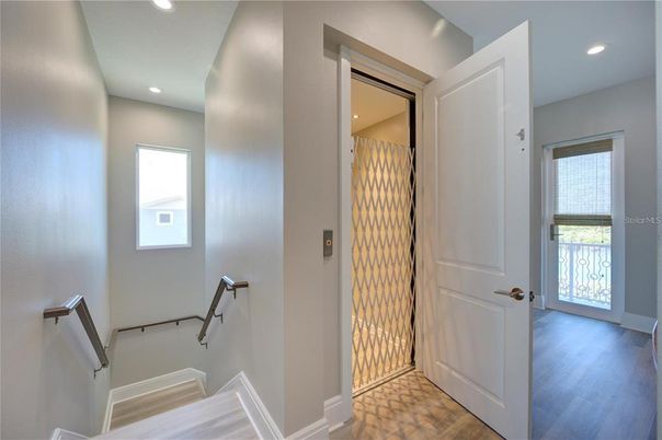 Elevator, Interior, Recessed Lighting, Wood Texture Flooring