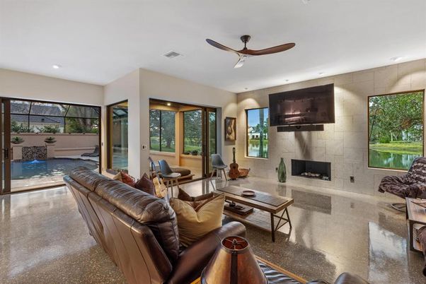 Fireplace, Interior, Living room, Pool, Recessed Lighting, Stone Walls