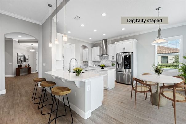 Dining room, Interior, Kitchen, Pendant Lights, Recessed Lighting, Stainless Steel Appliances, Wood Texture Flooring