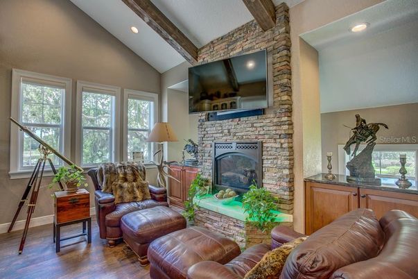 Fireplace, Interior, Living room, Recessed Lighting, Stone Walls, Wooden Beams, Wood Texture Flooring