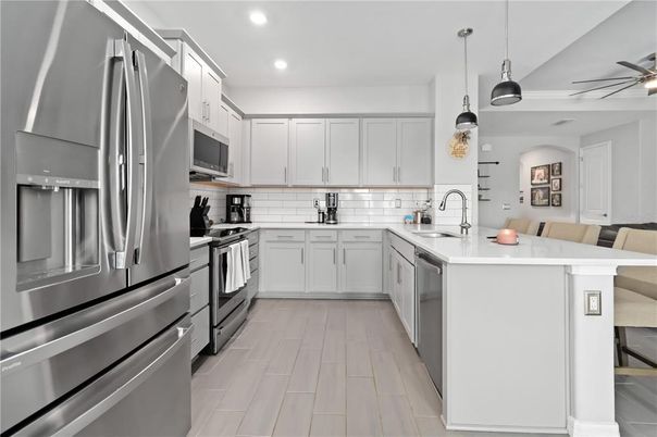 Interior, Kitchen, Pendant Lights, Recessed Lighting, Stainless Steel Appliances, Wood Texture Flooring