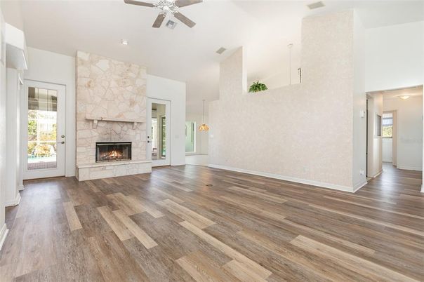 Empty room, Fireplace, Interior, Pendant Lights, Recessed Lighting, Wood Texture Flooring