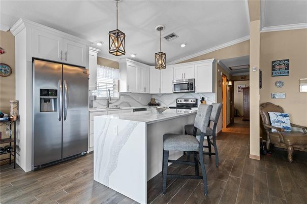 Interior, Kitchen, Pendant Lights, Recessed Lighting, Stainless Steel Appliances, Wood Texture Flooring