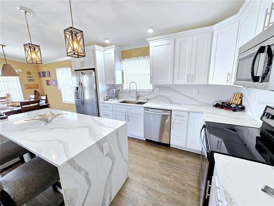 Interior, Kitchen, Pendant Lights, Recessed Lighting, Stainless Steel Appliances, Wood Texture Flooring