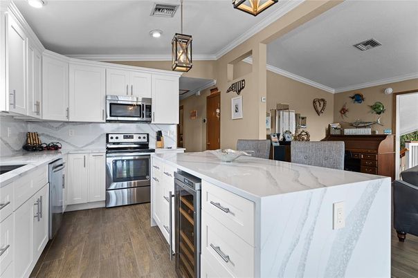 Interior, Kitchen, Pendant Lights, Recessed Lighting, Stainless Steel Appliances, Wood Texture Flooring