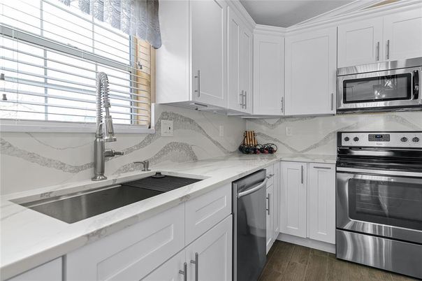 Interior, Kitchen, Marble Walls, Stainless Steel Appliances, Wood Texture Flooring