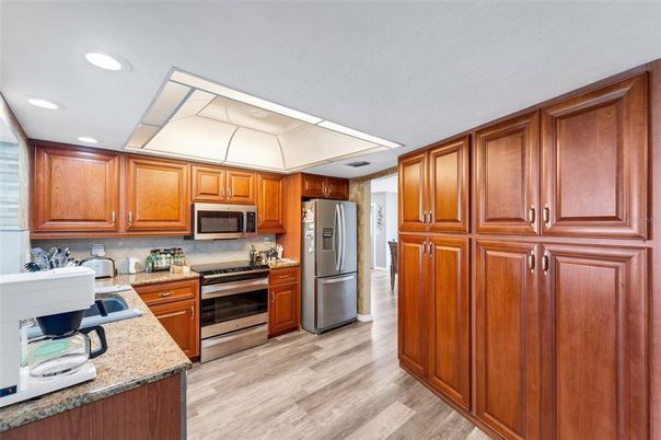 Interior, Kitchen, Recessed Lighting, Stainless Steel Appliances, Wood Texture Flooring