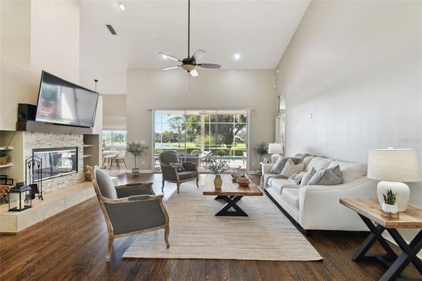 Fireplace, Interior, Living room, Recessed Lighting, Stone Walls, Wood Texture Flooring