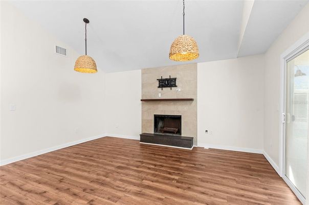 Empty room, Fireplace, Interior, Pendant Lights, Wood Texture Flooring