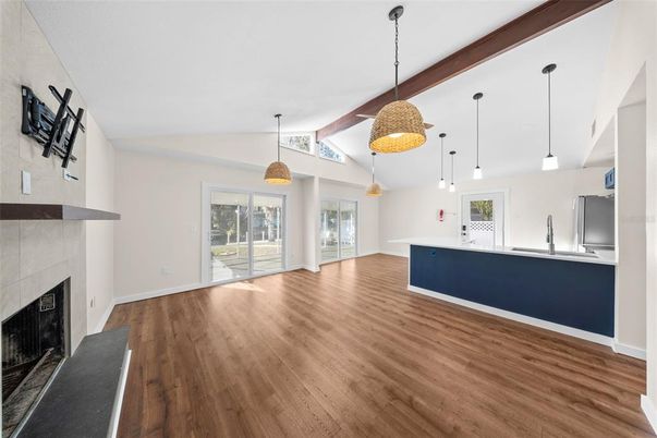 Empty room, Fireplace, Interior, Pendant Lights, Wood Texture Flooring