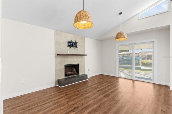 Empty room, Fireplace, Interior, Pendant Lights, Wood Texture Flooring