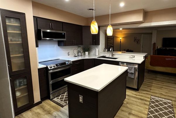 Interior, Kitchen, Pendant Lights, Recessed Lighting, Stainless Steel Appliances, Wood Texture Flooring
