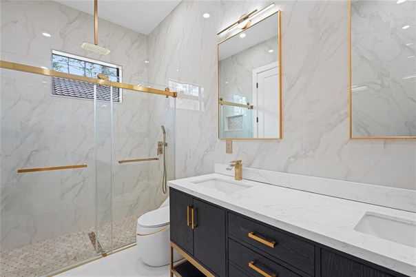 Bathroom, Dual Sink Vanities, Glass Shower, Interior, Marble Walls