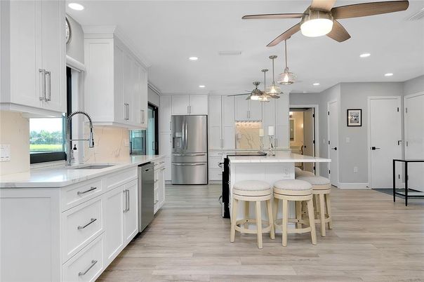 Interior, Kitchen, Pendant Lights, Recessed Lighting, Stainless Steel Appliances, Wood Texture Flooring