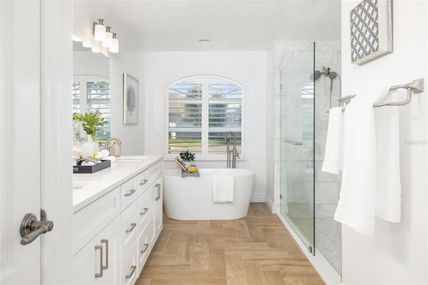 Bathroom, Dual Sink Vanities, Free Standing Baths, Glass Shower, Interior, Wood Texture Flooring