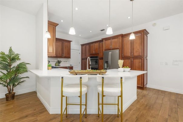 Interior, Kitchen, Pendant Lights, Recessed Lighting, Stainless Steel Appliances, Wood Texture Flooring