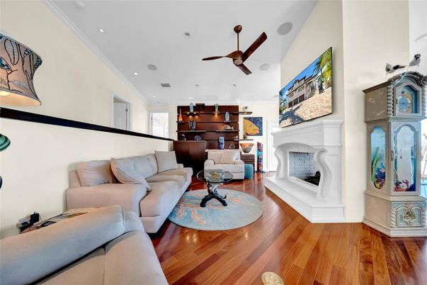 Fireplace, Interior, Living room, Recessed Lighting, Wood Texture Flooring