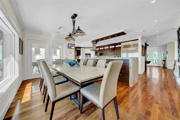 Dining room, Interior, Kitchen, Pendant Lights, Recessed Lighting, Stainless Steel Appliances, Wood Texture Flooring