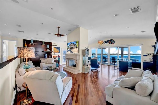 Fireplace, Interior, Living room, Recessed Lighting, Water, Wood Texture Flooring