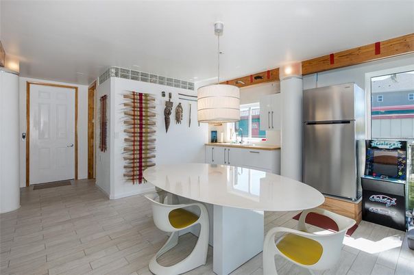 Dining room, Interior, Kitchen, Pendant Lights, Stainless Steel Appliances, Wood Texture Flooring