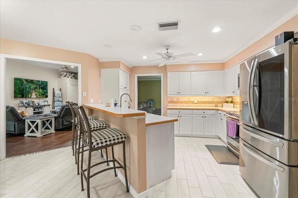 Interior, Kitchen, Recessed Lighting, Stainless Steel Appliances, Wood Texture Flooring