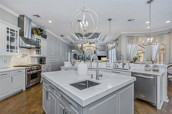 Chandelier, Interior, Kitchen, Pendant Lights, Recessed Lighting, Stainless Steel Appliances, Wood Texture Flooring