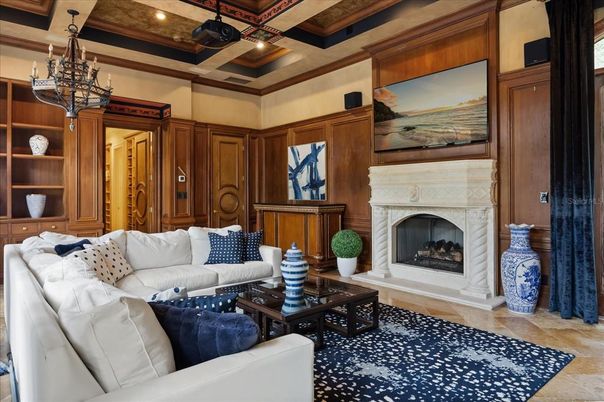 Chandelier, Fireplace, Interior, Living room, Recessed Lighting, Wooden Beams, Wooden Walls