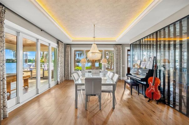 Dining room, Interior, Pendant Lights, Piano, Wood Texture Flooring