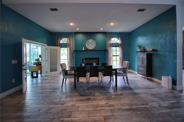 Dining room, Fireplace, Interior, Recessed Lighting, Wood Texture Flooring