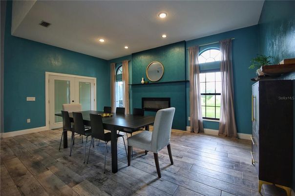 Dining room, Fireplace, Interior, Recessed Lighting, Wood Texture Flooring