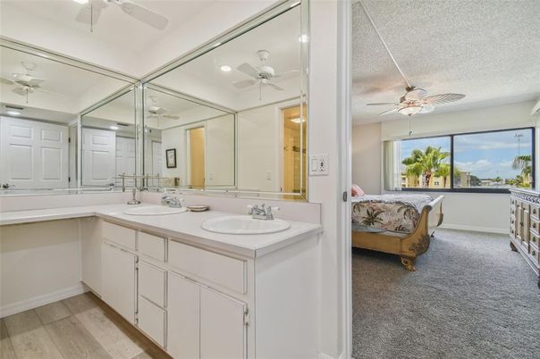 Bathroom, Bedroom, Dual Sink Vanities, Interior, Recessed Lighting, Wood Texture Flooring