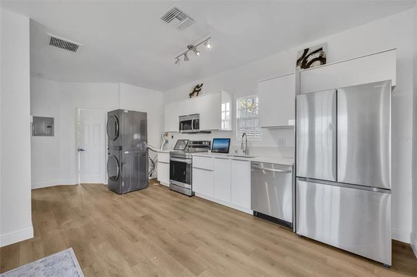 Interior, Kitchen, Stainless Steel Appliances, Washer, Wood Texture Flooring