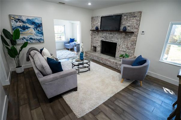 Fireplace, Interior, Living room, Recessed Lighting, Stone Walls, Wood Texture Flooring