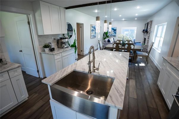 Dining room, Interior, Kitchen, Pendant Lights, Recessed Lighting, Stainless Steel Appliances, Wood Texture Flooring