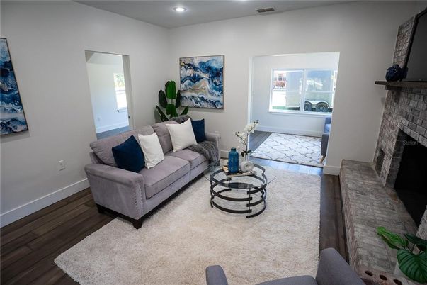 Fireplace, Interior, Living room, Recessed Lighting, Wood Texture Flooring