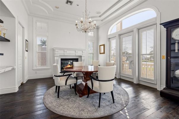 Chandelier, Dining room, Fireplace, Interior, Recessed Lighting, Wood Texture Flooring