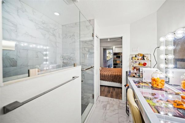 Bathroom, Bedroom, Glass Shower, Interior, Marble, Marble Walls, Recessed Lighting, Wood Texture Flooring