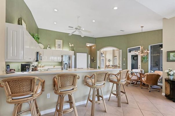 Chandelier, Dining room, Interior, Kitchen, Pendant Lights, Recessed Lighting, Stainless Steel Appliances