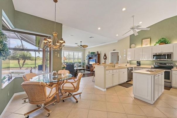 Chandelier, Dining room, Interior, Kitchen, Living room, Recessed Lighting, Stainless Steel Appliances