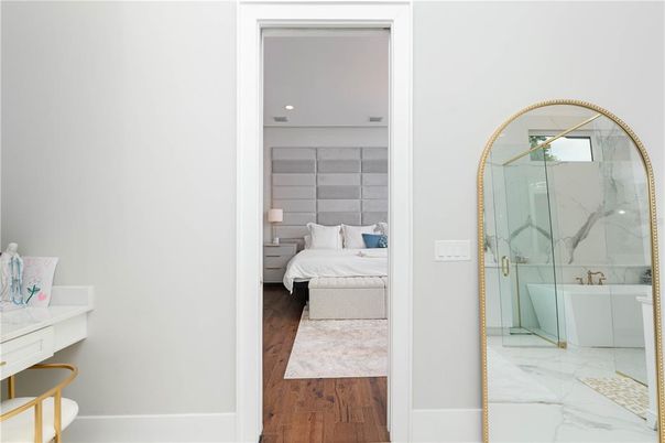 Bathroom, Bedroom, Glass Shower, Interior, Marble, Marble Walls, Recessed Lighting, Wood Texture Flooring