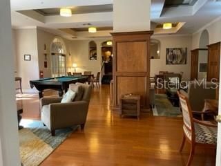 Billiard Table, Game Room, Interior, Living room, Pendant Lights, Recessed Lighting, Wood Texture Flooring