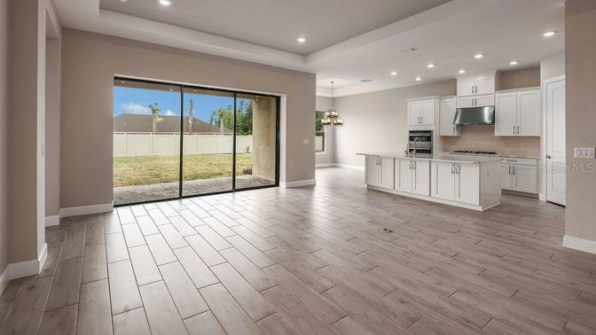 Chandelier, Interior, Kitchen, Recessed Lighting, Stainless Steel Appliances, Wood Texture Flooring