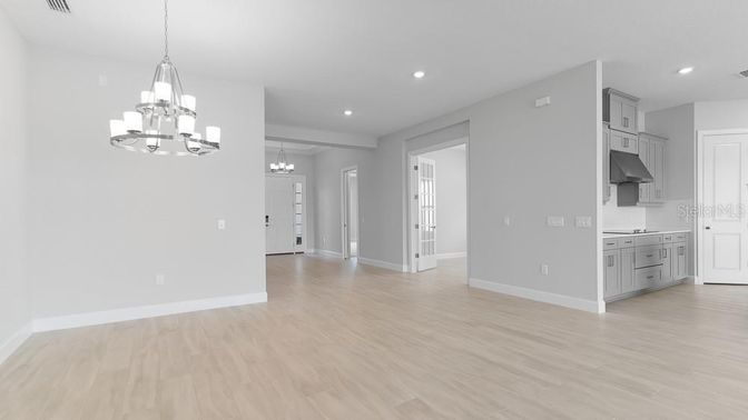 Chandelier, Empty room, Interior, Recessed Lighting, Wood Texture Flooring